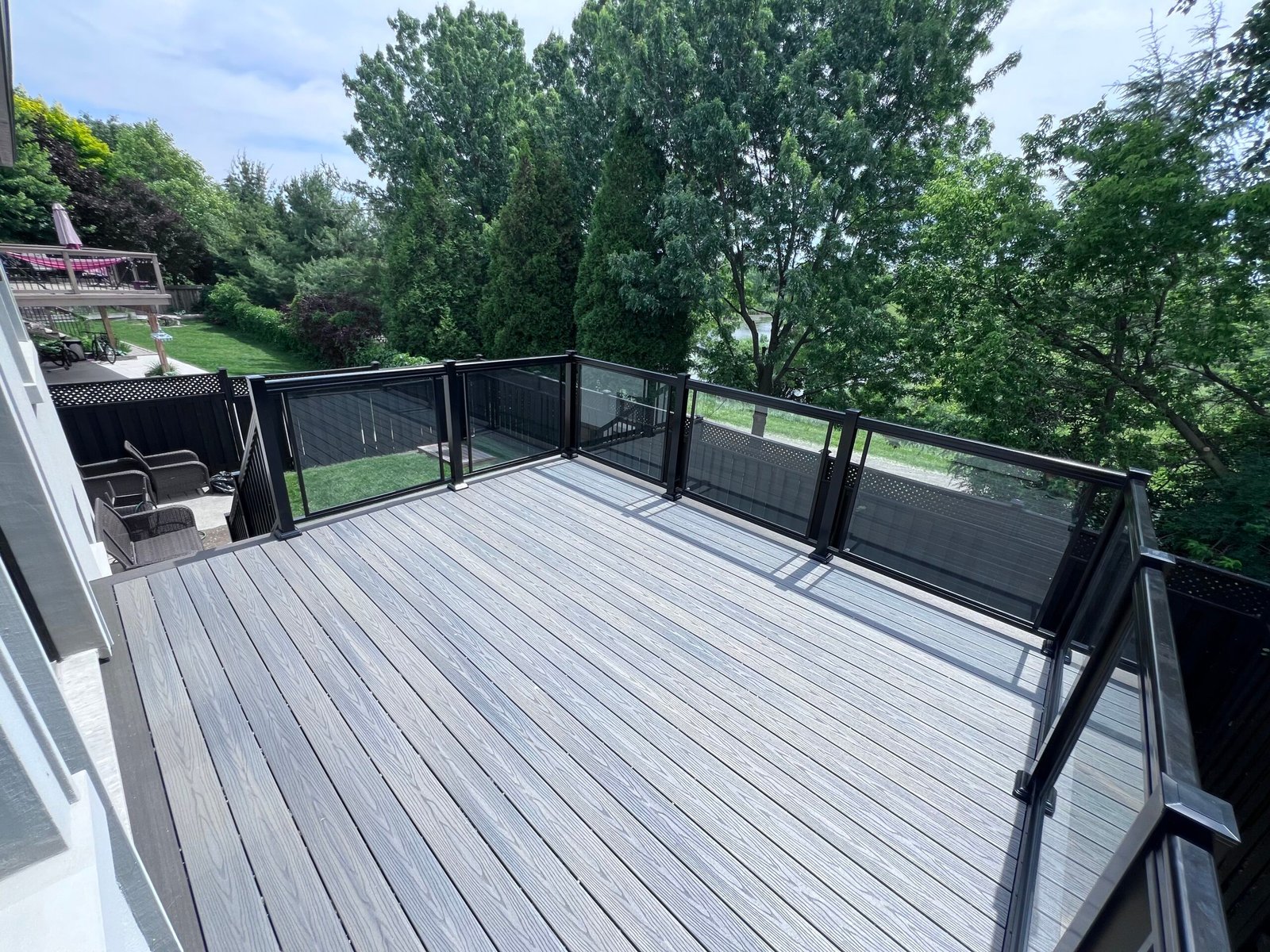 Composite deck glass railing Toronto — Hi-Quality Homes Inc.